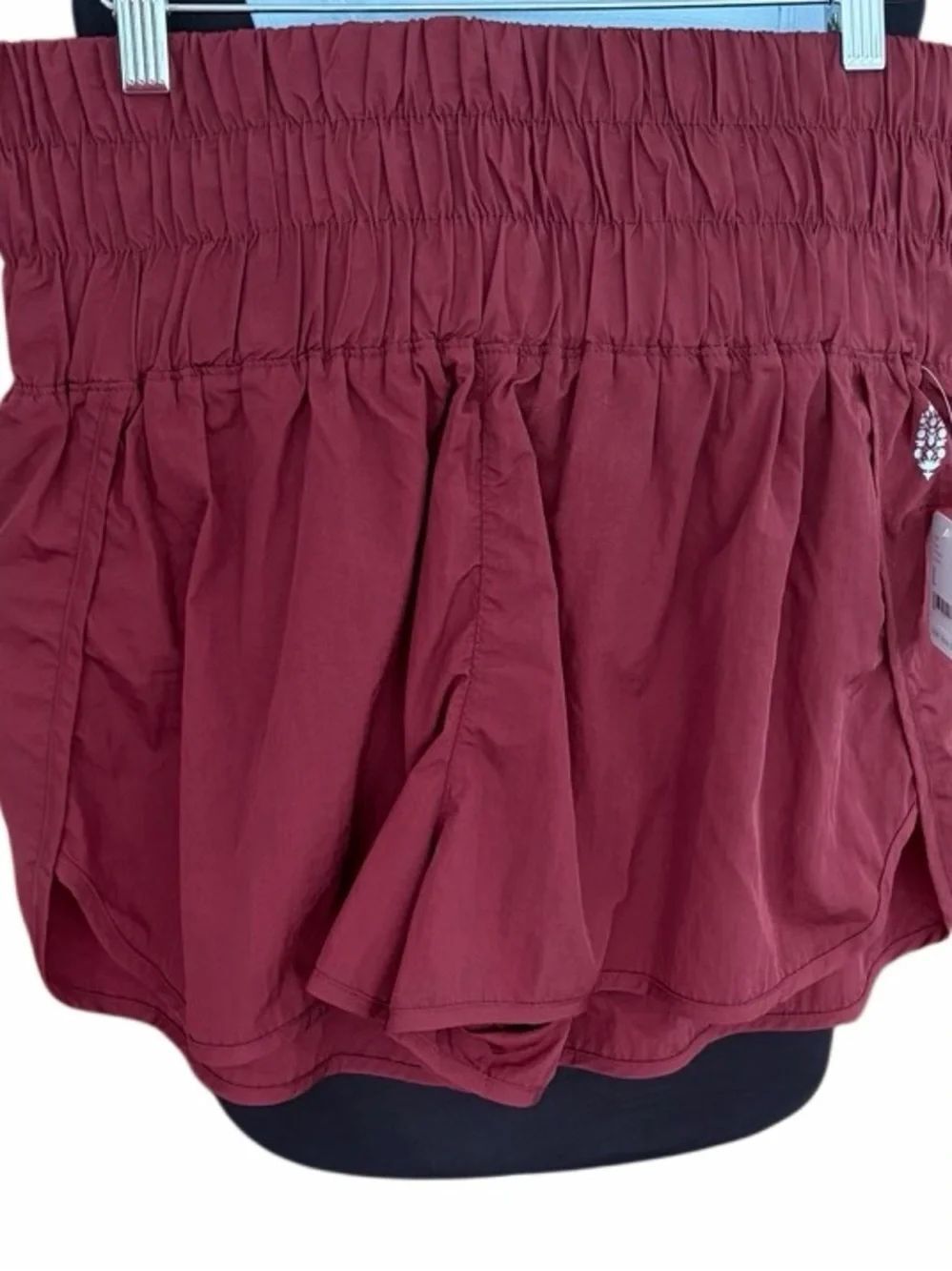 New with Tags FP Movement Get Your Flirt On shorts, burgundy, size L.